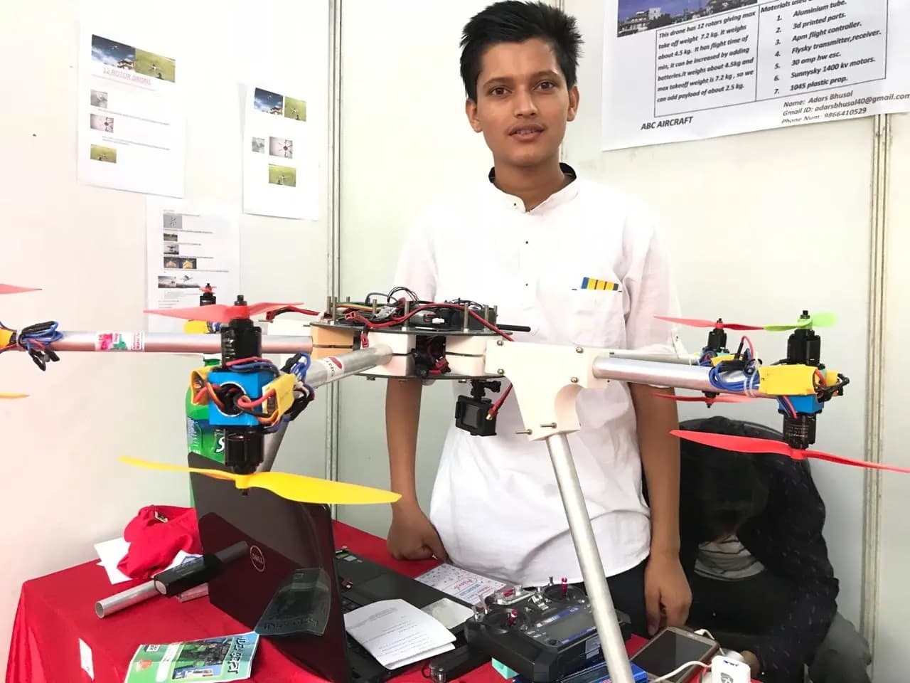 Adarsha as a teenager with his multirotor at the Kathmandu Mini Maker Faire, 2018